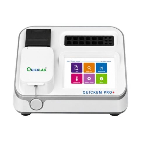 Automated lab instrument with a touchscreen and QuickLab module labeled Quickem Pro+, likely a compact clinical analyzer used for sample processing and analysis